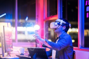 Young male wearing wearable goggle headset